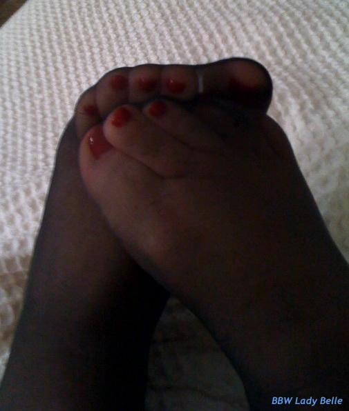 Goddess Belle’s Foot Slave Begs Under Her Perfect Stocking Feet